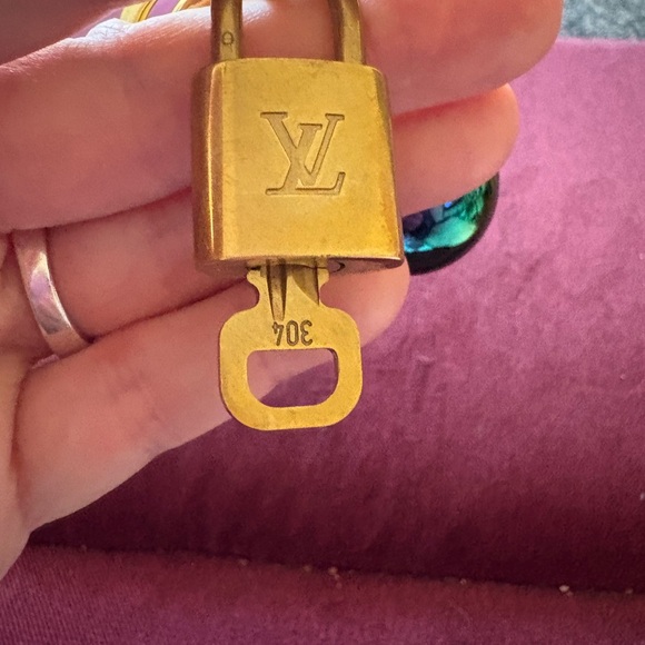 Louis Vuitton lock and key on a Multicolor Cherry Keychain - Picture 3 of 3